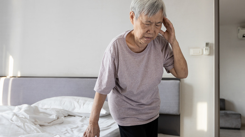 lightheaded after 50 person feeling dizzy while sitting on bed in morning