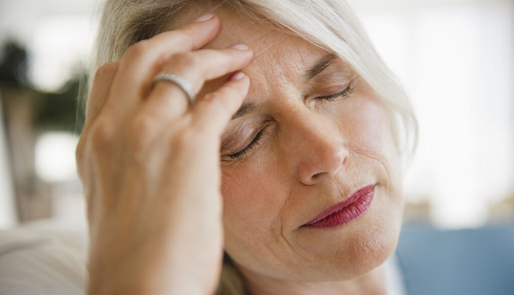 pressure in temples after 50 holding head