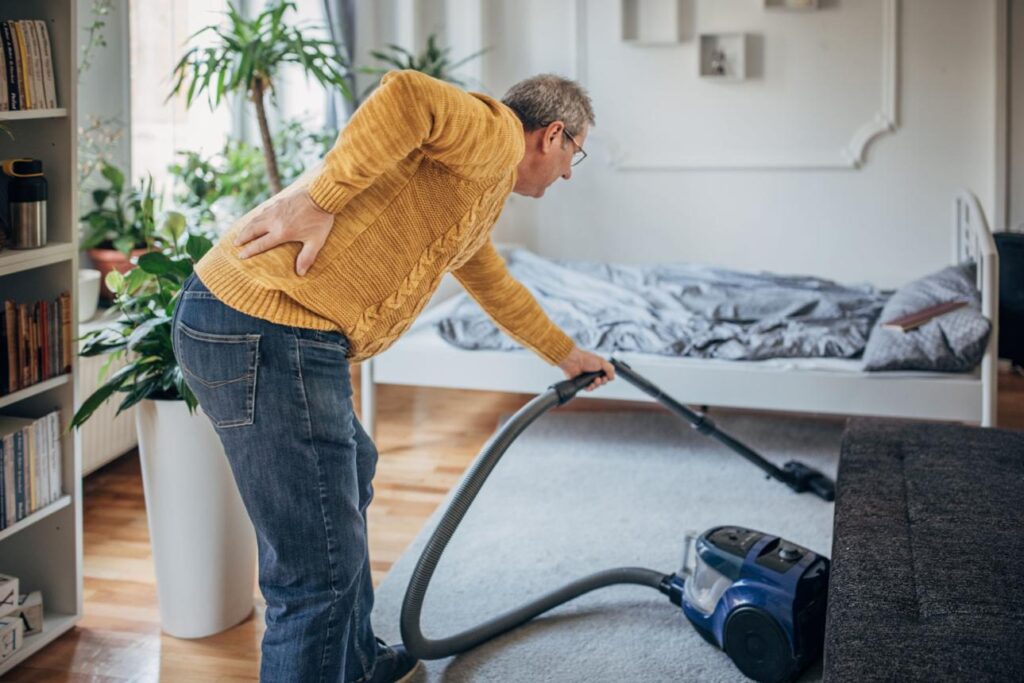 heavy corded vacuum causing strain and difficulty after 50