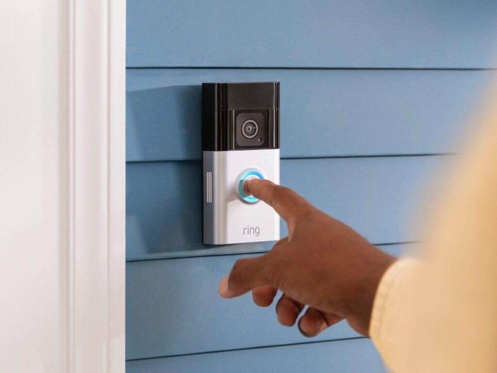 home security after 50 with visible front door security camera deterrent