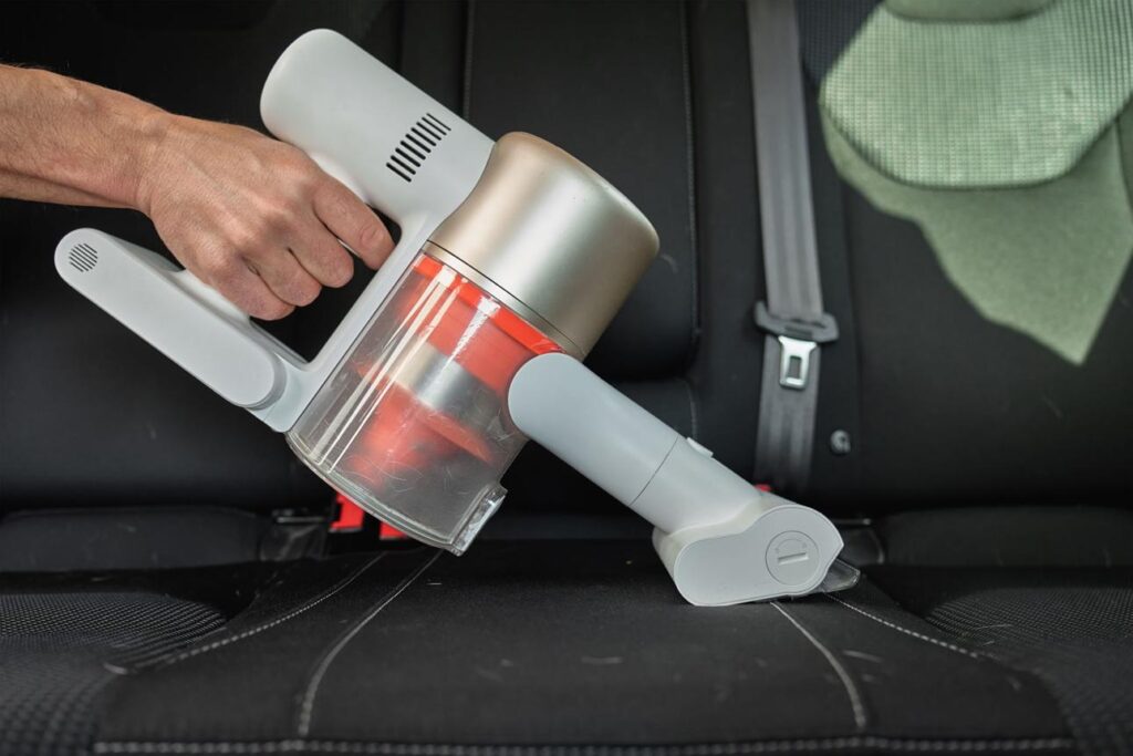 handheld cordless vacuum for easy car cleaning after 50