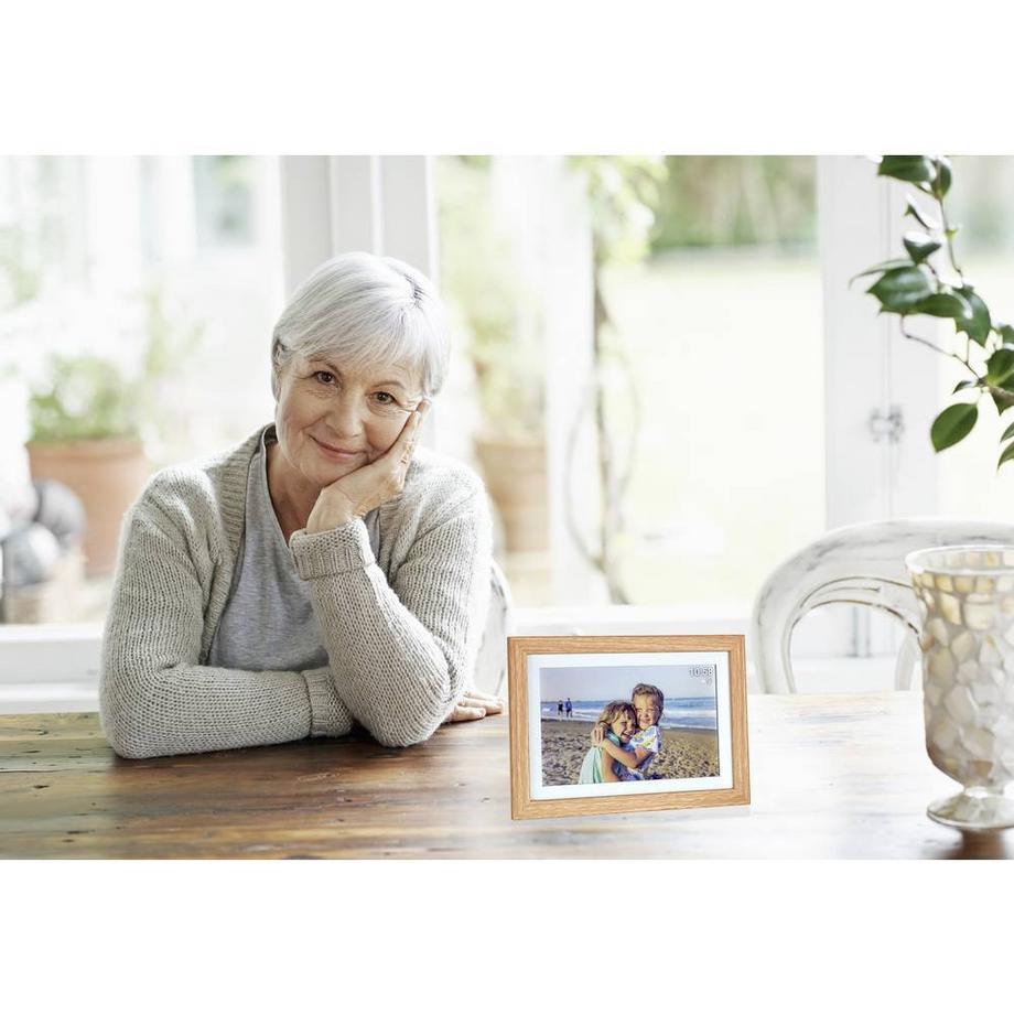 Digital photo frames for staying connected with family after 50 display shared photos and family memories.