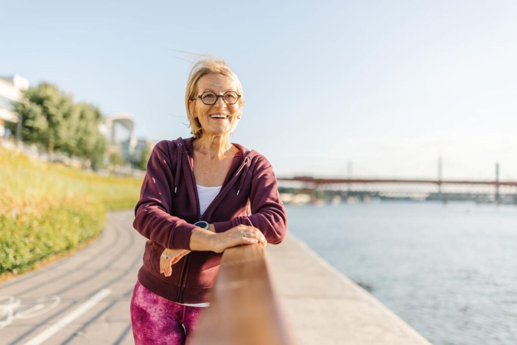 Confident adults over 50 enjoying an active and positive lifestyle outdoors.