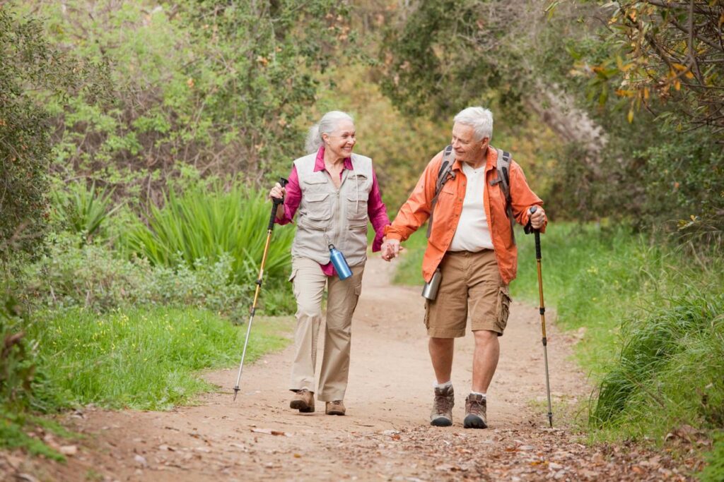 Confident adults over 50 embracing life's uncertainties with a positive outlook.