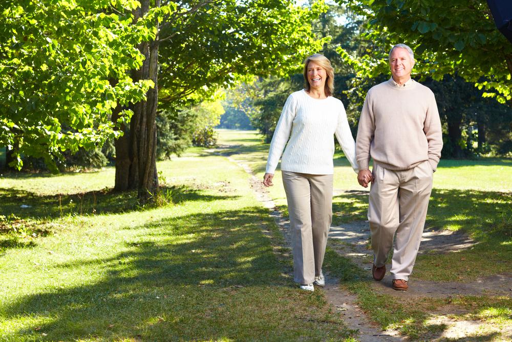 Healthy couple over 50 enjoying an active lifestyle to reduce fear of illness and support healthy aging